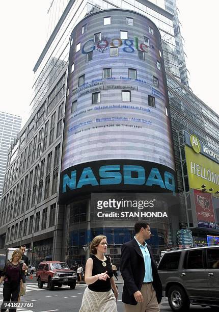 Internet-stocks-IT-company-Google In this 19 August 2004 file photo, the Google logo is displayed on a giant screen outside the Nasdaq Market Site...