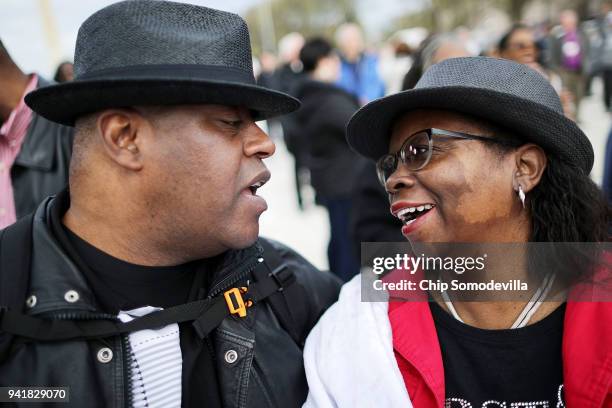 Thousands gather and sing "This Little Light of Mine" on the National Mall during a prayer rally to mark the 50th anniversary of Dr. Martin Luther...