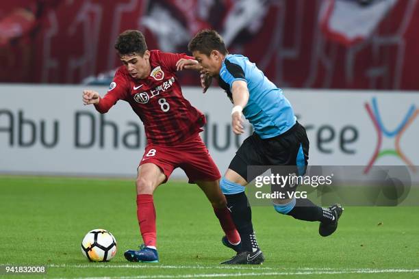 Oscar of Shanghai SIPG drives the ball during AFC Champions League Group F match between Shanghai SIPG and Kawasaki Frontale at the Shanghai Stadium...