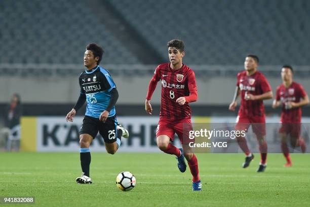 Oscar of Shanghai SIPG drives the ball during AFC Champions League Group F match between Shanghai SIPG and Kawasaki Frontale at the Shanghai Stadium...