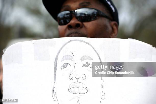 Thousands gather on the National Mall for a prayer rally to mark the 50th anniversary of Dr. Martin Luther King Jr.'s assassination April 4, 2018 in...