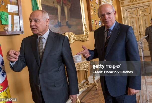 Secretary General of the League of Arab States Ahmed Aboul Gheit and Portuguese Foreign Minister Augusto Santos Silva leave at the end of a joint...