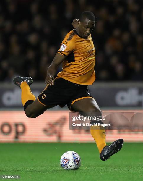 Willy Boly of Wolverhampton Wanderers takes a shot at goal during the Sky Bet Championship match between Wolverhampton Wanderers and Hull City at...