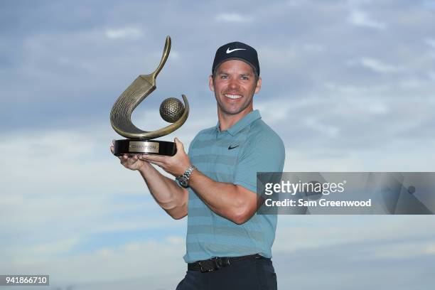Paul Casey of England poses with the Valspar Championship trophy after winning at Innisbrook Resort Copperhead Course on March 11, 2018 in Palm...