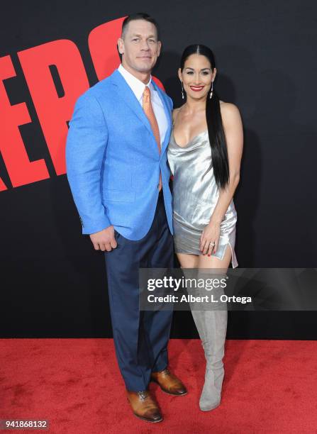 Actor/wrestler John Cena and wrestler Nikki Bella arrive for the Premiere Of Universal Pictures' "Blockers" held at Regency Village Theatre on April...
