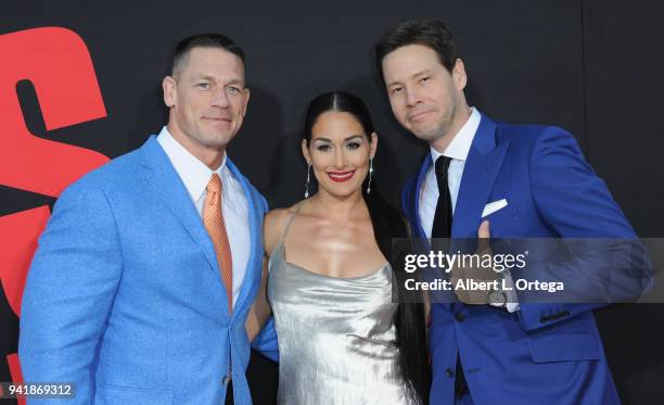 John Cena, Nikki Bella and Ike Barinholtz arrive for the Premiere Of Universal Pictures' "Blockers" held at Regency Village Theatre on April 3, 2018...