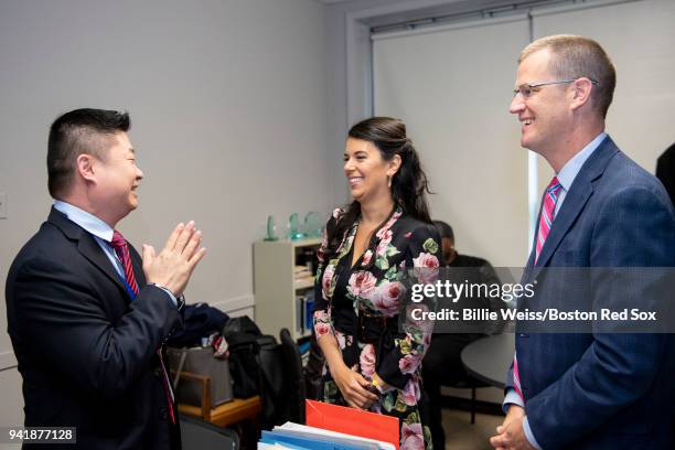 Boston Public Schools superintendent Tommy Chang greets Boston Red Sox Foundation Board Member Linda Pizzuti Henry and Boston Red Sox President & CEO...