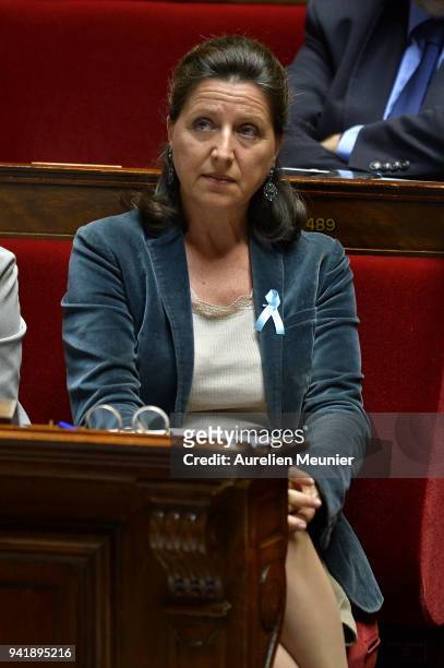 French Health and Solidarity Minister Agnes Buzyn reacts as Ministers answer deputies during the weekly session of questions to the government at...