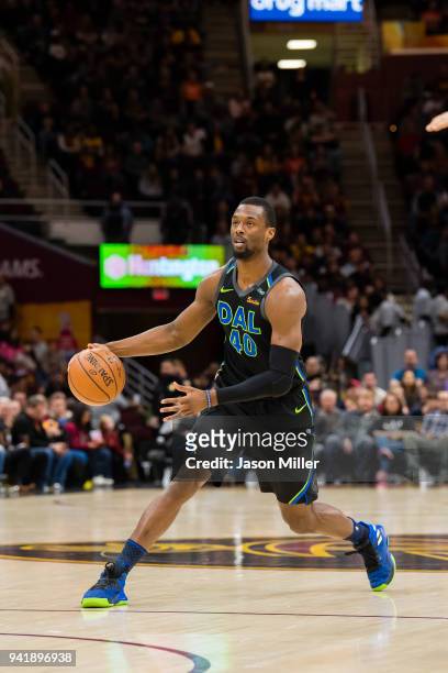 Harrison Barnes of the Dallas Mavericks drives the ball down court against the Cleveland Cavaliers during the first half at Quicken Loans Arena on...
