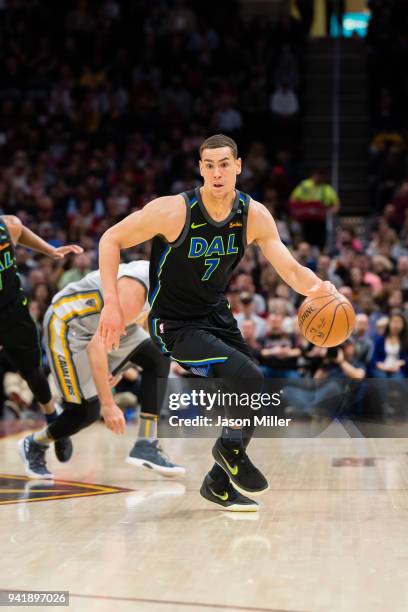 Dwight Powell of the Dallas Mavericks drives down court against the Cleveland Cavaliers during the first half at Quicken Loans Arena on April 1, 2018...