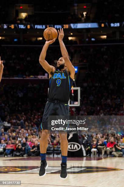 Aaron Harrison of the Dallas Mavericks shoots against the Cleveland Cavaliers during the first half at Quicken Loans Arena on April 1, 2018 in...