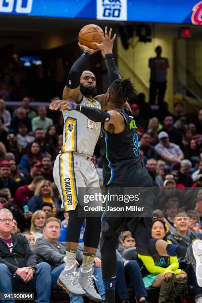 LeBron James of the Cleveland Cavaliers shoots a jump shot over Nerlens Noel of the Dallas Mavericks during the second half at Quicken Loans Arena on...