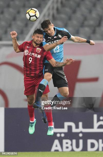 Elkeson de Oliveira Cardoso of Shanghai SIPG and Carlos Eduardo Bendini Giusti of Kawasaki Frontale in action during the 2018 AFC Champions League...