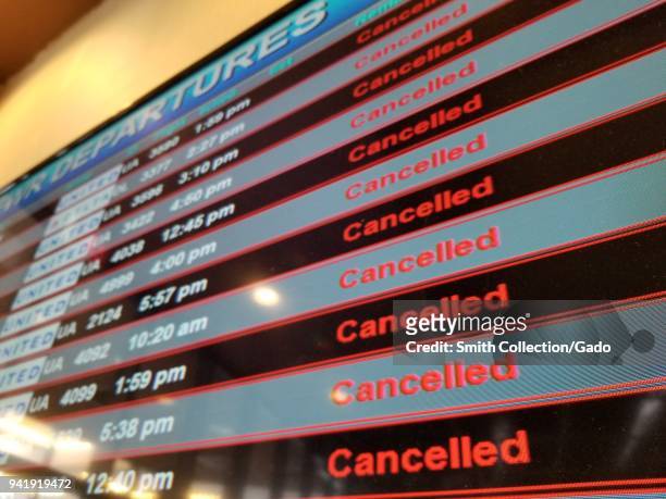 Flight departures board showing all flights canceled during a snow event at Newark International Airport, Newark, New Jersey, March 21, 2018.