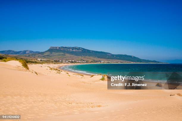 bolonia beach in tarifa. - cadiz spain stock pictures, royalty-free photos & images