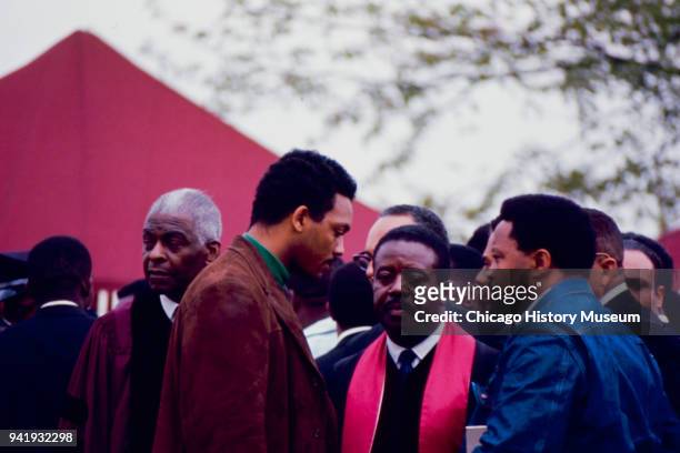American Civil Rights and religious leaders Benjamin May , Jesse Jackson and Ralph Abernathy stand with unidentified others during Dr Martin Luther...