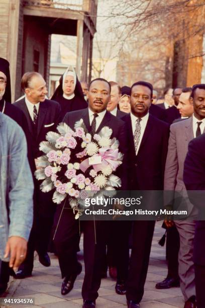 View of, from center, Dr Martin Luther King Jr , Reverend Ralph Abernathy , and Reverend Fred Shuttlesworth as they lead Reverend James Reeb's...