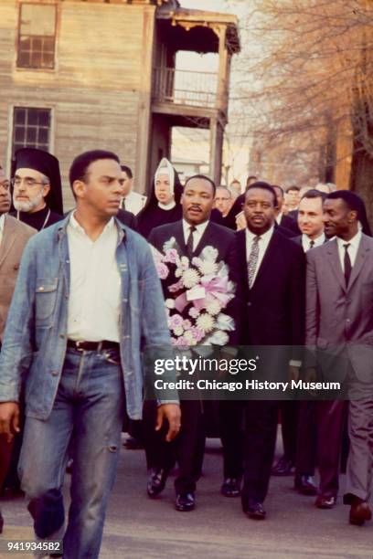 View of Civil Rights activist Andrew Young and, among those behind him, religious leaders Archbishop Iakovos , Dr Martin Luther King Jr , Reverend...