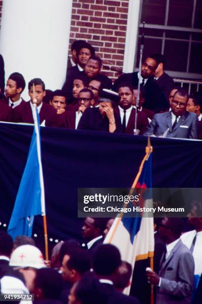 Flagbearers pass American Civil Rights activist Rosa Parks , among other mourners and students, during Dr Martin Luther King Jr's public memorial...