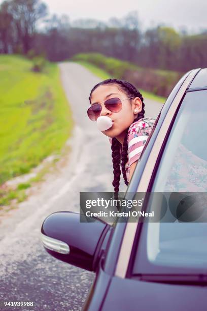 teenage girl on road trip with sunglasses and braids - kristal stock pictures, royalty-free photos & images