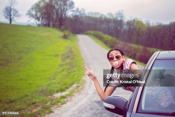 teenage girl on road trip with sunglasses and braids - kristal stock pictures, royalty-free photos & images