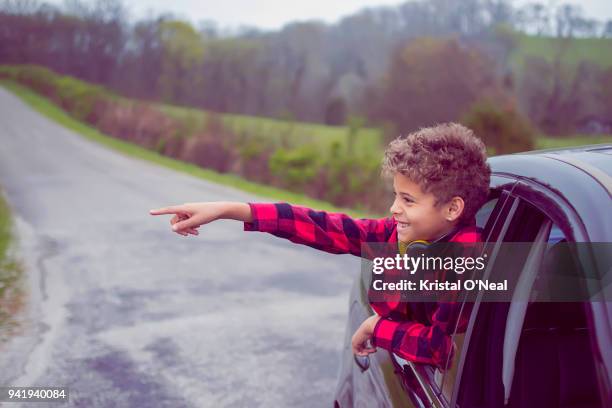 young boy on family road trip - kristal stock pictures, royalty-free photos & images