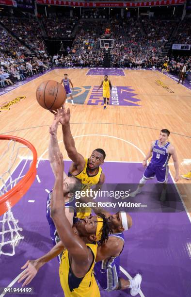 Kosta Koufos and Vince Carter of the Sacramento Kings rebound against Myles Turner and Thaddeus Young of the Indiana Pacers on March 29, 2018 at...