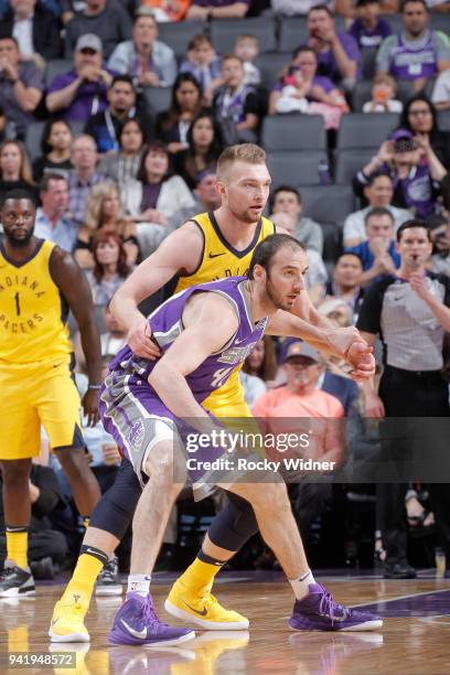 Domantas Sabonis of the Indiana Pacers defends against Kosta Koufos of the Sacramento Kings on March 29, 2018 at Golden 1 Center in Sacramento,...