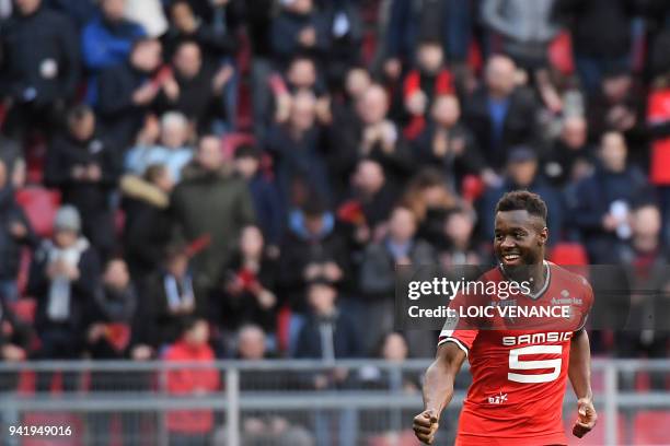 Rennes' French defender Joris Gnagnon celebrates after scoring a goal during the French L1 football match Rennes vs Monaco at the Roazhon Park...