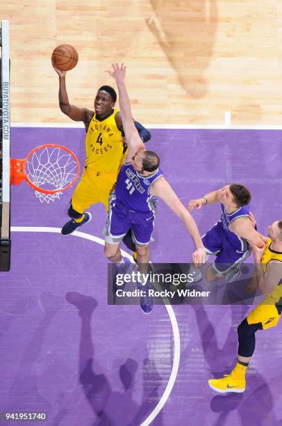 Victor Oladipo of the Indiana Pacers shoots against Kosta Koufos of the Sacramento Kings on March 29, 2018 at Golden 1 Center in Sacramento,...