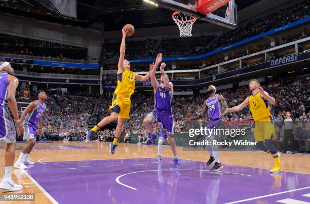 Bojan Bogdanovic of the Indiana Pacers shoots against Kosta Koufos of the Sacramento Kings on March 29, 2018 at Golden 1 Center in Sacramento,...