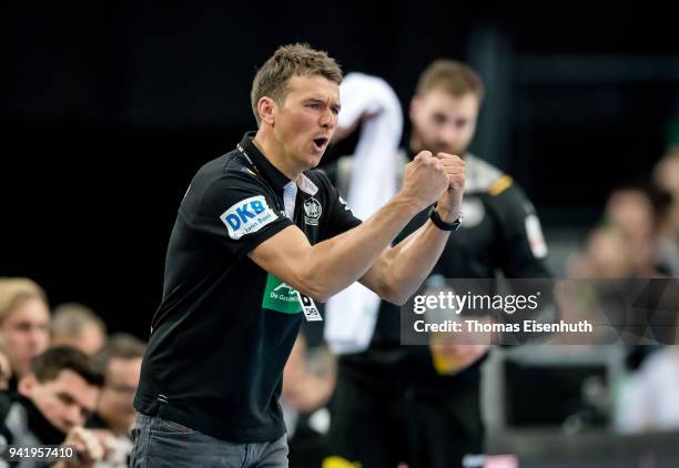 Coach Christian Prokop of Germany celebrates during the handball international friendly match between Germany and Serbia at Arena Leipzig on April 4,...