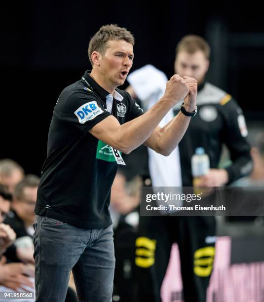 Coach Christian Prokop of Germany celebrates during the handball international friendly match between Germany and Serbia at Arena Leipzig on April 4,...