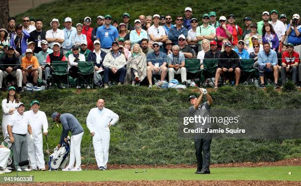 Sandy Lyle of Scotland plays a tee shot during the Par 3 Contest prior to the start of the 2018 Masters Tournament at Augusta National Golf Club on...