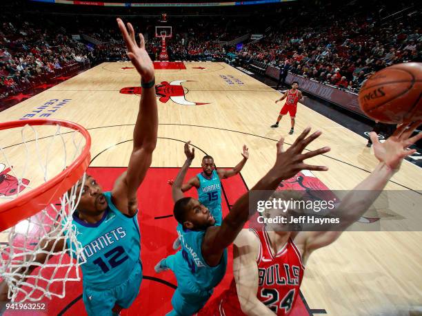 Lauri Markkanen of the Chicago Bulls shoots the ball during the game against the Charlotte Hornets on April 3, 2018 at the United Center in Chicago,...