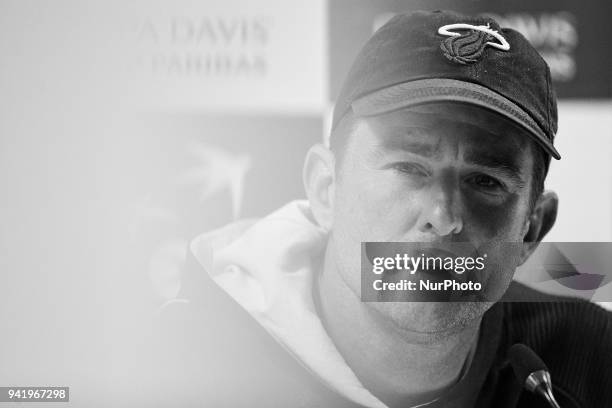 The image has been converted to black and white) Michael Kohlmann Captain of Germany attends a press conference ahead of the Davis Cup World Group...