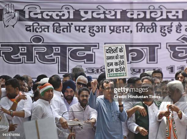 President Ajay Maken lead the protest march from Jaisingh Road to Parliament Street against the SC/ST rights' violation on April 4, 2018 in New...