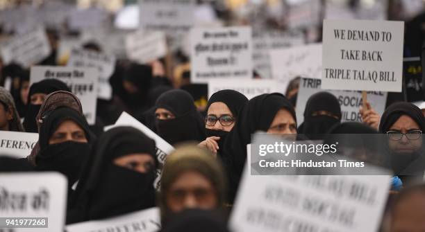 Muslim women protest against the triple talaq bill passed by the Lok Sabha at Ramlila Ground on April 4, 2018 in New Delhi, India.