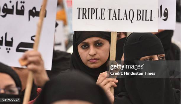 Muslim women protest against the triple talaq bill passed by the Lok Sabha at Ramlila Ground on April 4, 2018 in New Delhi, India.