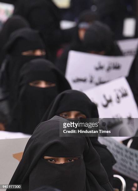 Muslim women protest against the triple talaq bill passed by the Lok Sabha at Ramlila Ground on April 4, 2018 in New Delhi, India.
