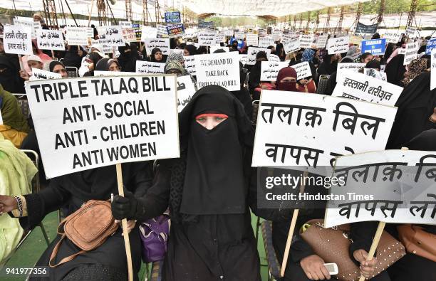 Muslim women protest against the triple talaq bill passed by the Lok Sabha at Ramlila Ground on April 4, 2018 in New Delhi, India.