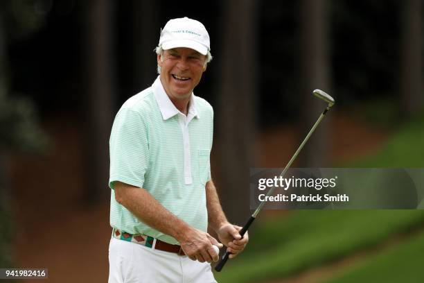Ben Crenshaw of the United States smiles during the Par 3 Contest prior to the start of the 2018 Masters Tournament at Augusta National Golf Club on...
