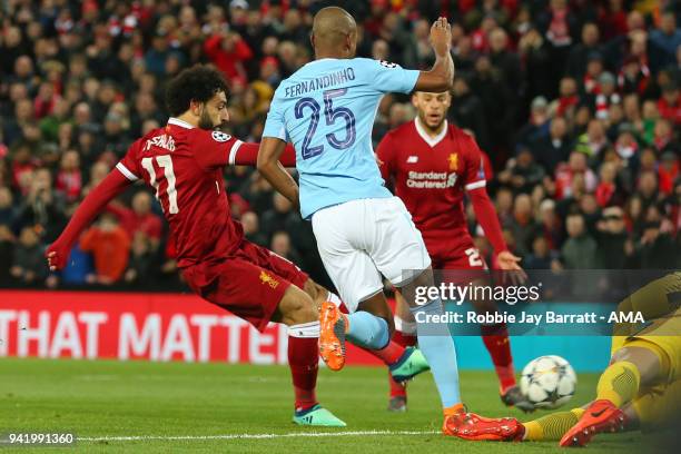 Mohamed Salah of Liverpool scores a goal to make it 1-0 during the UEFA Champions League Quarter Final first leg match between Liverpool and...