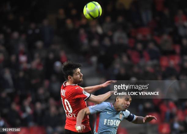 Rennes' French midfielder Sanjin Prcic vies with Monaco's Colombian forward Radamel Falcao during the French L1 football match Rennes vs Monaco at...