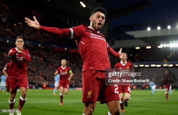 Alex Oxlade-Chamberlain of Liverpool celebrates after scoring his sides second goal during the UEFA Champions League Quarter Final Leg One match...