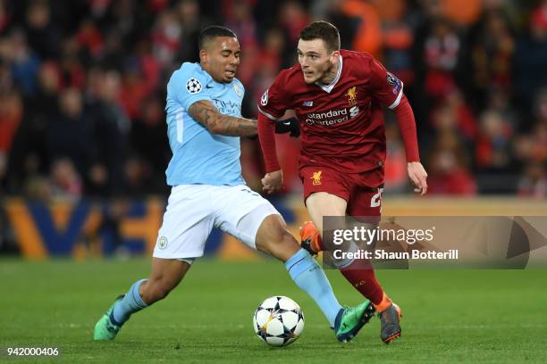 Andy Robertson of Liverpool is challenged by Gabriel Jesus of Manchester City during the UEFA Champions League Quarter Final Leg One match between...