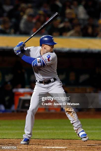 Ryan Rua of the Texas Rangers at bat against the Oakland Athletics during the fourth inning at the Oakland Coliseum on April 2, 2018 in Oakland,...