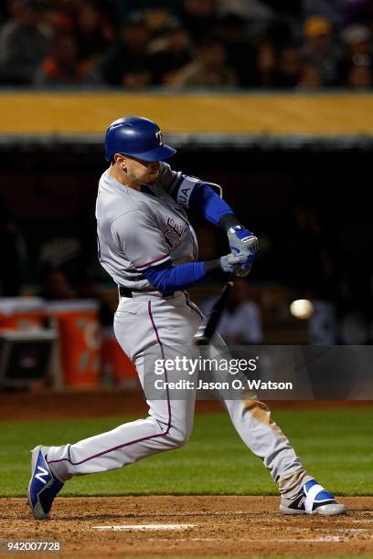 Ryan Rua of the Texas Rangers at bat against the Oakland Athletics during the fourth inning at the Oakland Coliseum on April 2, 2018 in Oakland,...