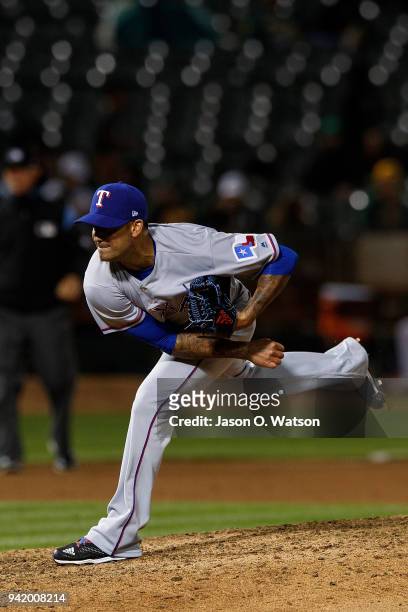 Matt Bush of the Texas Rangers pitches against the Oakland Athletics during the eighth inning at the Oakland Coliseum on April 2, 2018 in Oakland,...