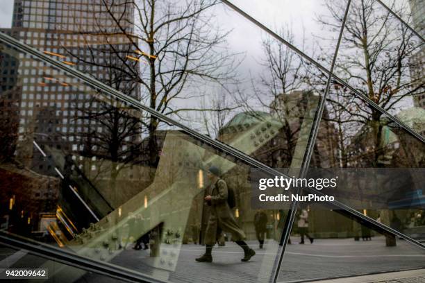 People visit The National September 11 Memorial in New York, March 13, 2018. The National September 11 Memorial &amp; Museum is a memorial and museum...